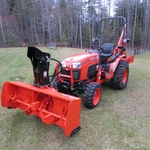 Kubota with a 63" front mount snow blower