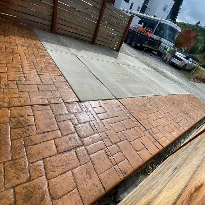 Wide Slate Stamped Border with a broomed interior.