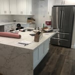New Kitchen, new island, new cabinets, new electrical and new floors, new doors and new windows