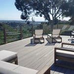 Composite deck with glass handail