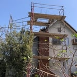 Demolishing earthquake damaged masonry chimney
