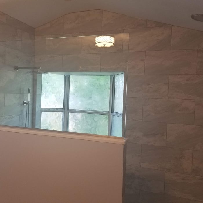 Finished shower with pony wall and glass.