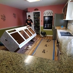 Full kitchen remodeling and countertop installation.