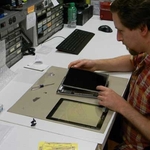 Technician Repairing an iPad