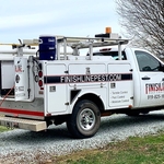 Termite truck with spray rig.