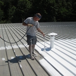 Spray Coating on Metal Roof in Gainesville, GA