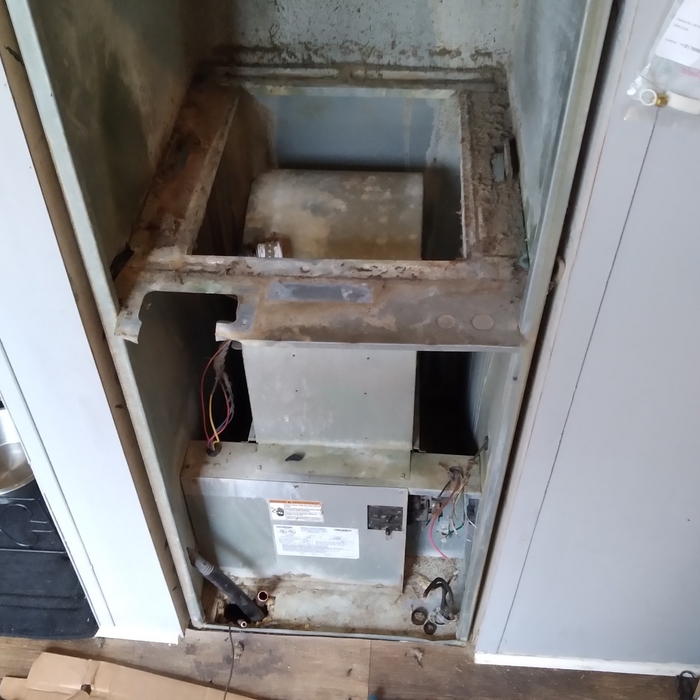 Tearing out the old furnace