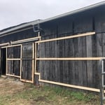 Furring strips over the wood siding.