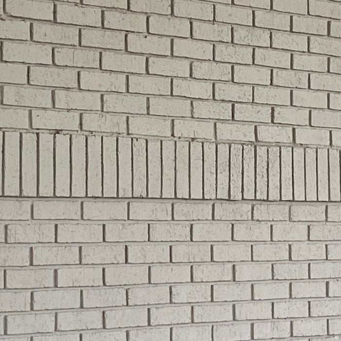 Existing cut brick exterior