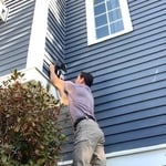 Carlos installing 1 of 4 RING Solar Cams overlooking the clients driveway.