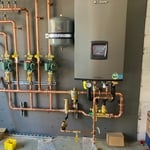 The new boiler and piping set up in our shop before transportation to the client