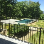 Deck, railings, ramp, stone retaining wall, patio & pool project