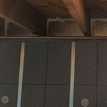 You can see that we've insulated and air sealed the rim joists in this picture in addition to the B2B paneling.