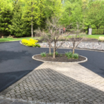 Asphalt sealcoating! We guarantee to keep all bricks, decorations, and house clean!