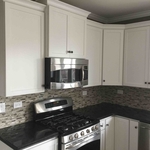 kitchen with custom backsplash