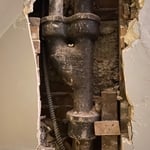 Leak discovers in wall at first floor