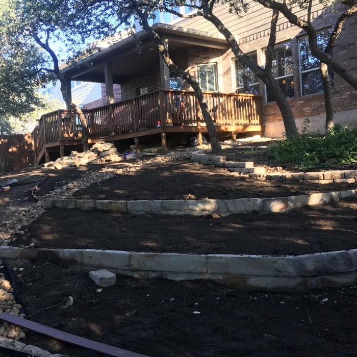 Drainage issues, steep slope, we got answers and we can even make it look beautiful