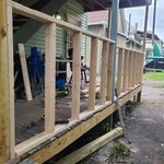 Reframed and new wood. Back porch deck
