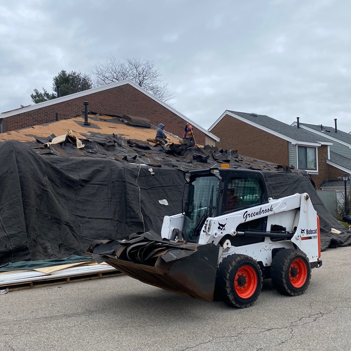 Used a skid steer where needed for debris