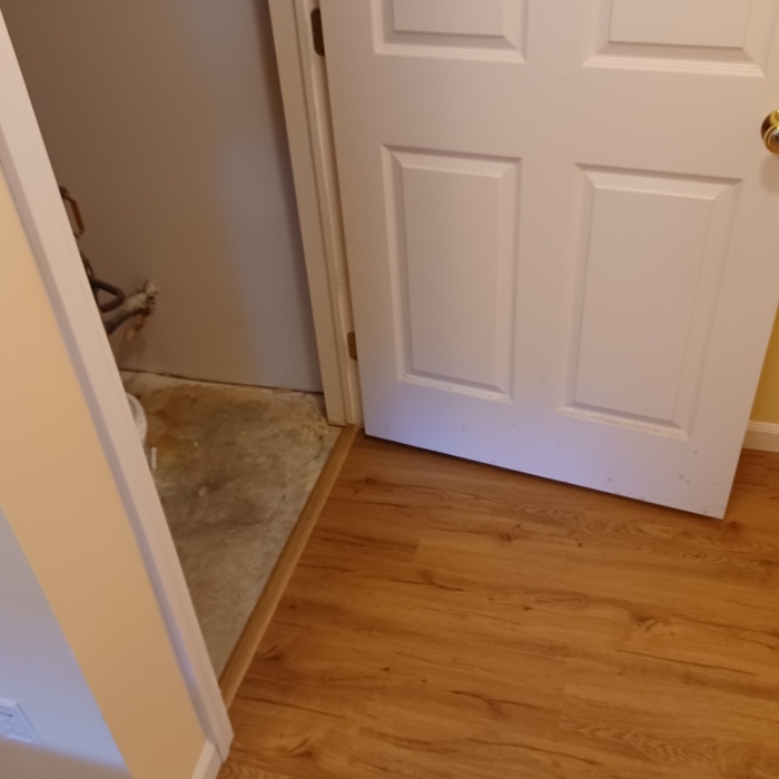 Flooring with a transition into the mechanical room