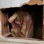 Big hole in wall, it was covered by a piece of panel