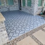 Beautiful ceramic tile installed over concrete patio