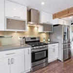 White shaker cabinets, Berenson hardware, contemporary/modern, subway backsplash