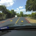 Part of tree top public schools euless Texas sealcoated and striped