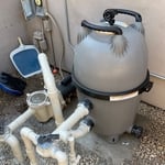 This is a new jandy cartridge filter installed with new plumbing and painted pipes.