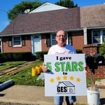 Happy customer after his new Enfinity Roof replacement