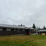 View of solar panels on main structure from ground level.
