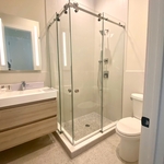 Sliding Glass Shower Door & Enclosure
This beautiful Frameless Sliding Glass Shower Door with 90 degree return enclosure, designed with 3/8” Clear Tempered Glass and Stainless Steel Hardware Serenity System.