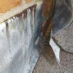 Original lead flashing installed incorrectly.