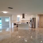 Kitchen was reconfigured and remodeled. All new appliances installed. Floors were replaced throughout. Interior doors and trim replaced. Interior was repainted.