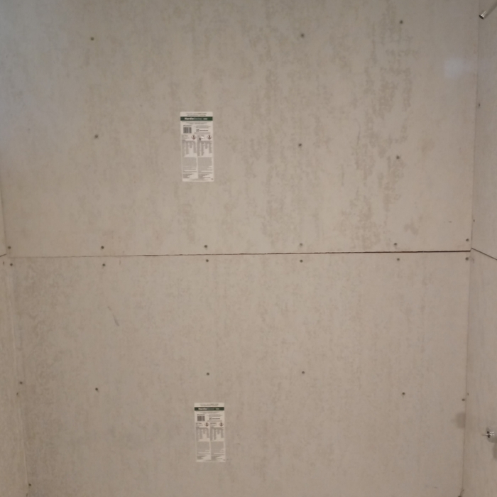 A different view of bathtub/ shower after new green board and backer board was installed.
