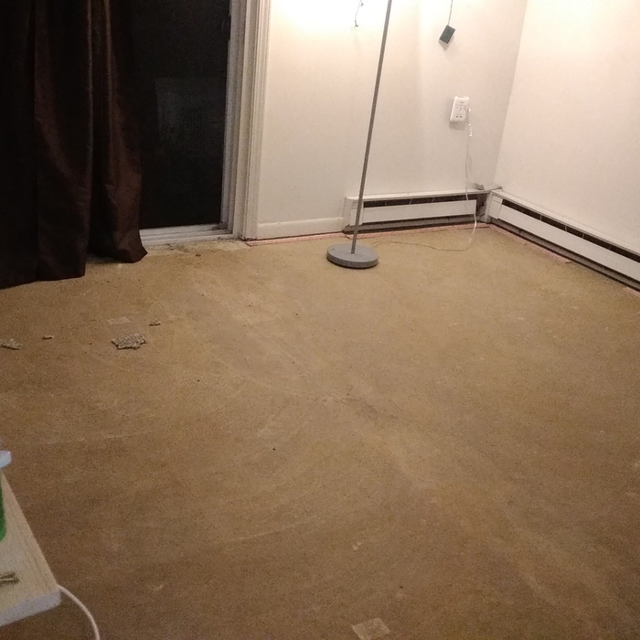 The floor after carpet removal