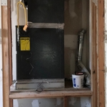 This is the closet that was been built. We ran new lines to service the equipment (gas, electrical, and drain).