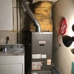 Here you can see the furnace and the connections that the previous contractor made to the duct system. This home had no AC previously.