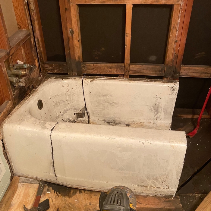 Remove old cast iron tub