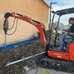 Installing Helical Piles for foundation repair