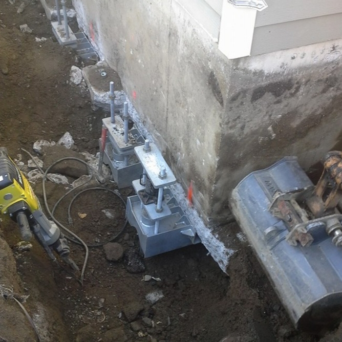 Concrete foundation underpinning brackets