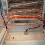 Evaporator after manual defrost and working heater, notice orange glow from heater.