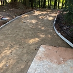 Excavated Driveway with crushed concrete base installed.