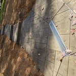 Decorative stamped steps to lake