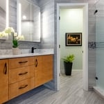 Beautiful combination of soft wood, cool tones and bold fixtures create the perfect statement.