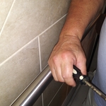 Installing gard safety handled in shower