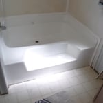 New fiberglass bathtub and new trim