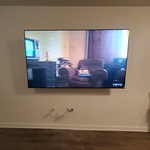 85" mounted with spectrum cable , modem. Router concealed behind the TV