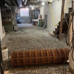 Getting ready to lay steel mesh prior to concrete pour.