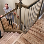 We placed new red oak stair treads over existing builder grade stair treads. The new treads are concaved (cut out) on the back to fit over existing treads without raising the height of step. They can be refinished several times, or painted. Low cost way to enhance your stairway.
